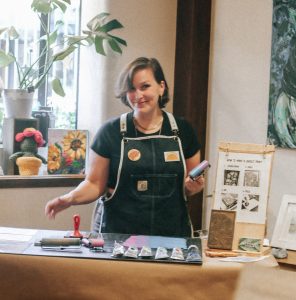 Liz Lucas demonstrating linocut printmaking